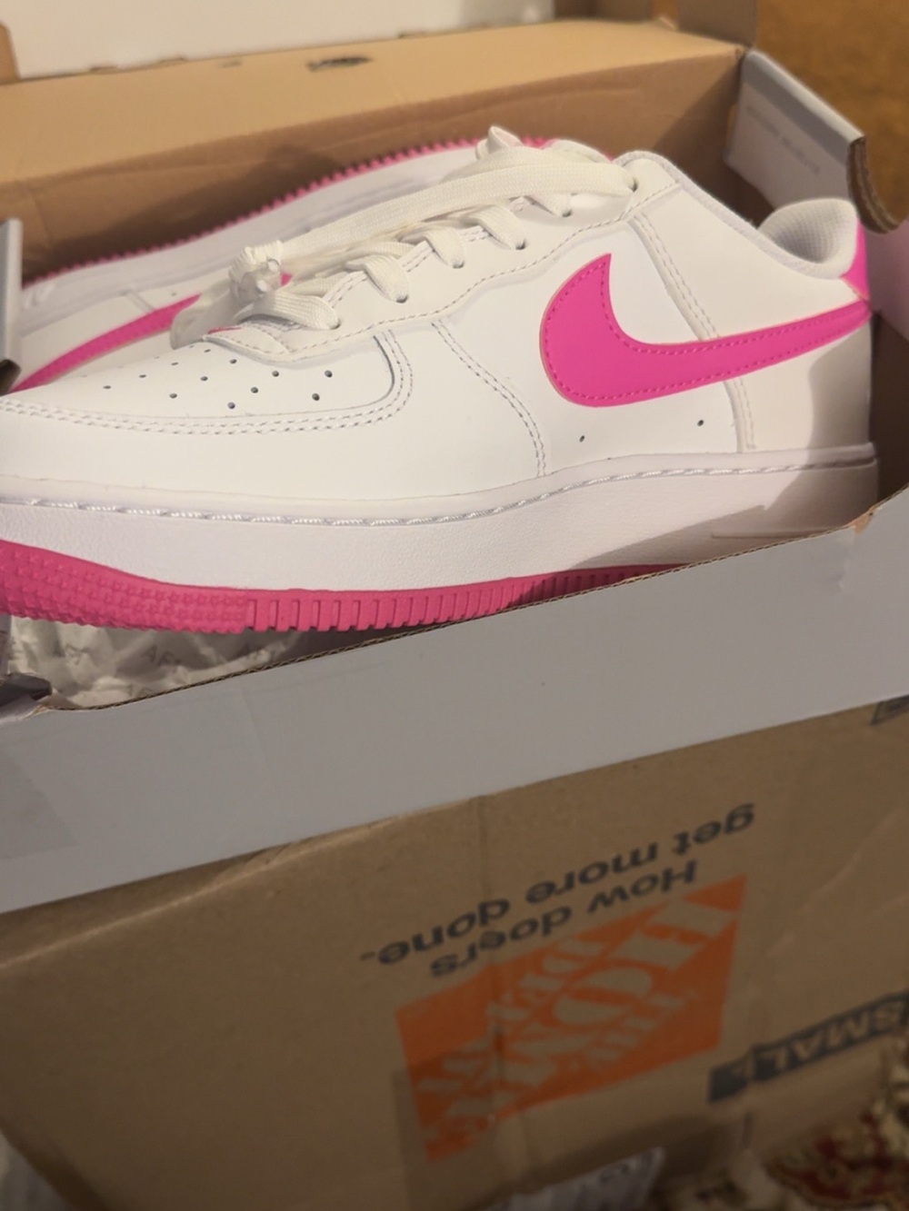 Nike Air Force 1 White Sneakers with Pink Swoosh